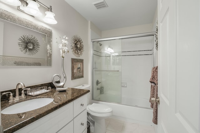 full bathroom featuring vanity, toilet, and enclosed tub / shower combo