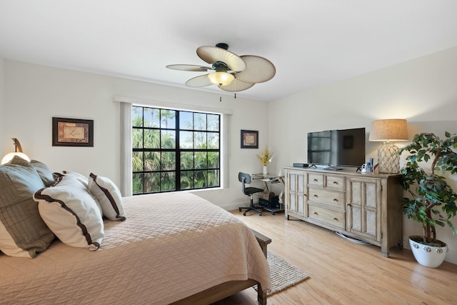 bedroom with light wood-type flooring and ceiling fan