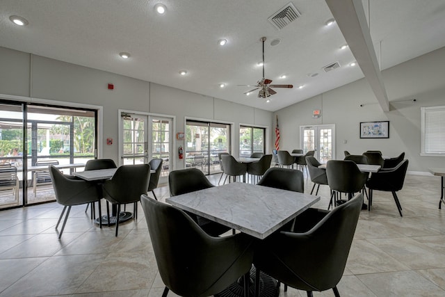 tiled dining area featuring ceiling fan, french doors, and a healthy amount of sunlight