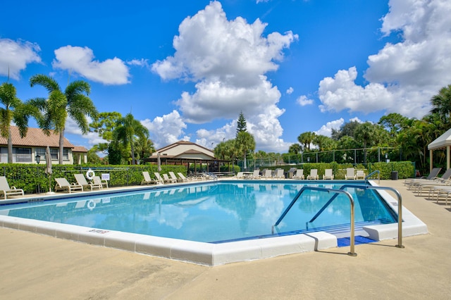 view of swimming pool featuring a patio