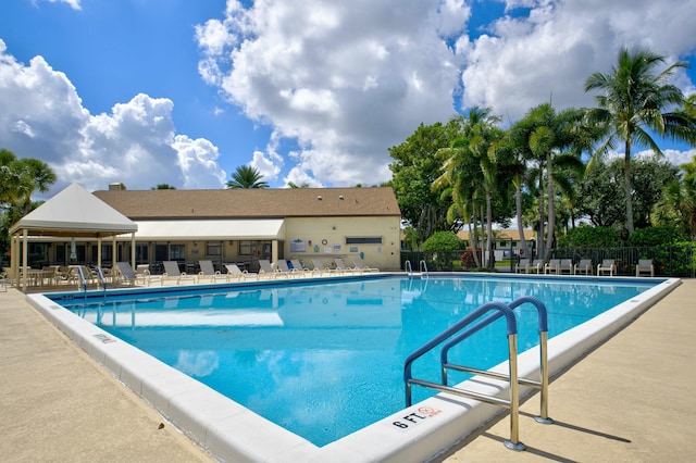 view of pool featuring a patio area