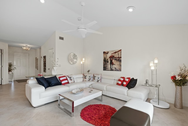 living room with ceiling fan and high vaulted ceiling