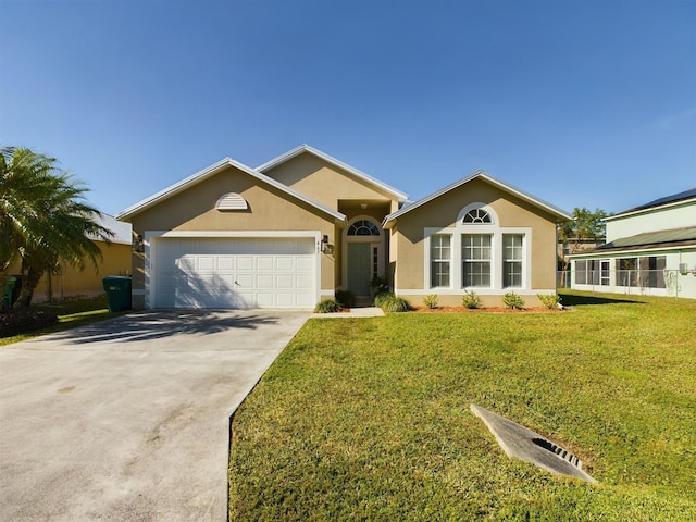 single story home with a front lawn and a garage