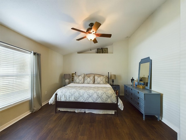 bedroom with ceiling fan, dark hardwood / wood-style flooring, and vaulted ceiling