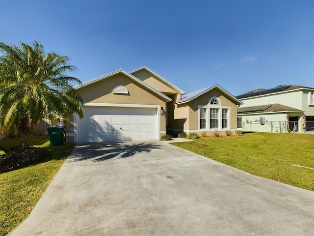 ranch-style house with a front yard and a garage