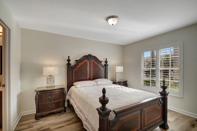 bedroom with light wood-type flooring