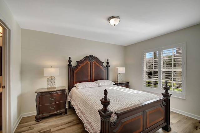 9383 Bridgeport Dr, West Palm Beach, FL 33411 - bedroom featuring light wood finished floors and baseboards