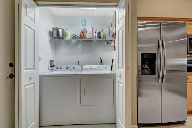 9383 Bridgeport Dr, West Palm Beach, FL 33411 - clothes washing area with washing machine and dryer