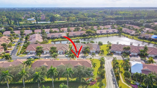 9383 Bridgeport Dr, West Palm Beach, FL 33411 - aerial view of property's location with nearby suburban area and a nearby body of water