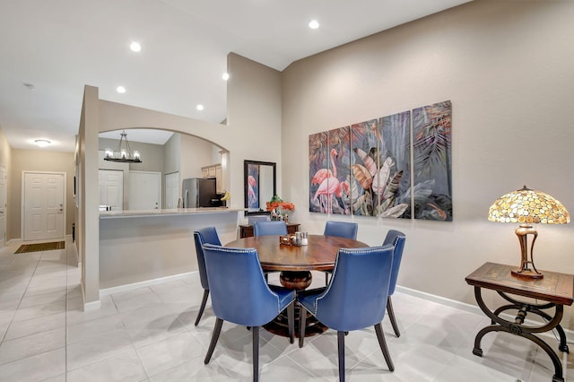 dining area with light tile patterned floors