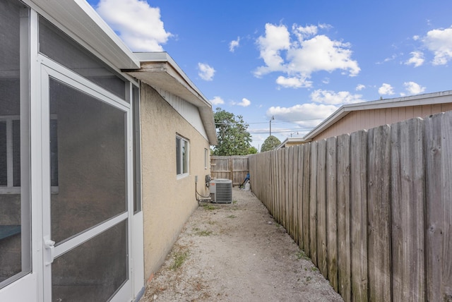 view of property exterior featuring central AC