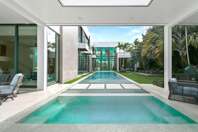 view of pool with a patio area