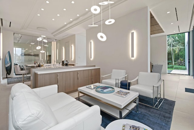 tiled living area featuring floor to ceiling windows and recessed lighting