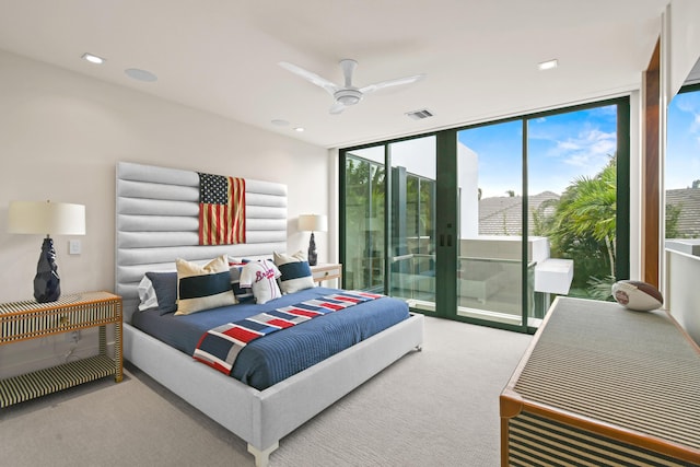 bedroom with carpet flooring, a ceiling fan, visible vents, access to outside, and floor to ceiling windows