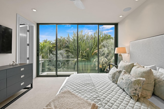 bedroom with ceiling fan, recessed lighting, light colored carpet, access to exterior, and expansive windows