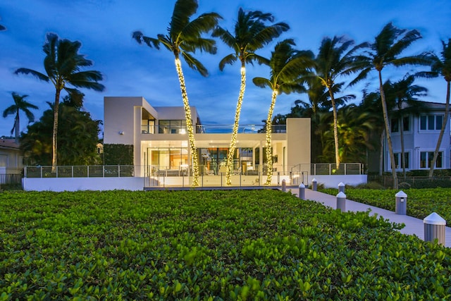 view of front of home with a lawn