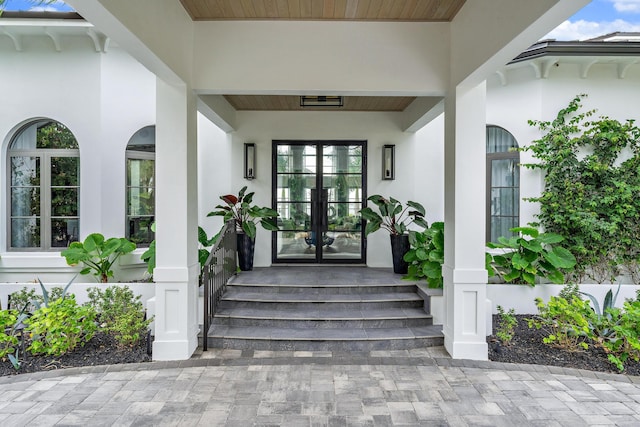 entrance to property featuring french doors