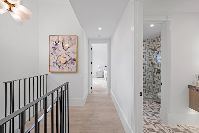 hallway featuring light hardwood / wood-style flooring