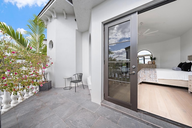 entrance to property with a patio