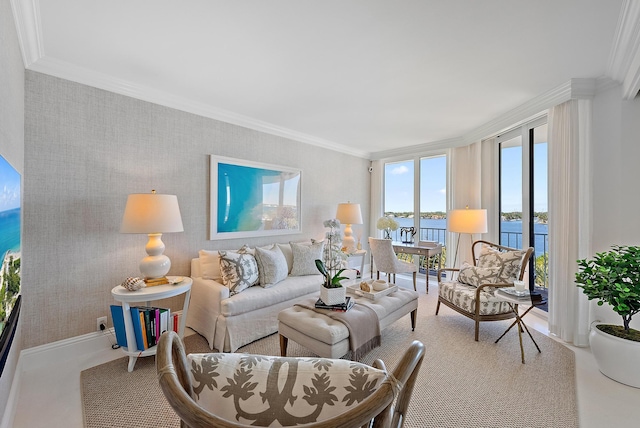 living room featuring a water view and ornamental molding