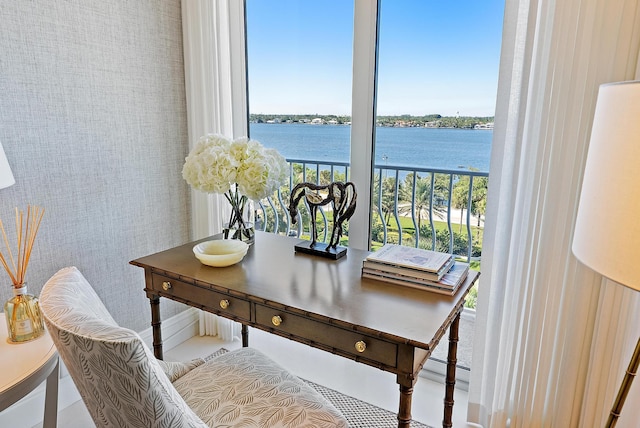 balcony featuring a water view