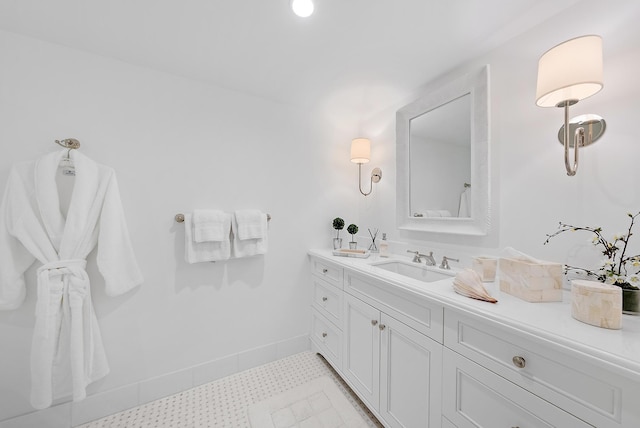 bathroom featuring tile patterned floors and vanity