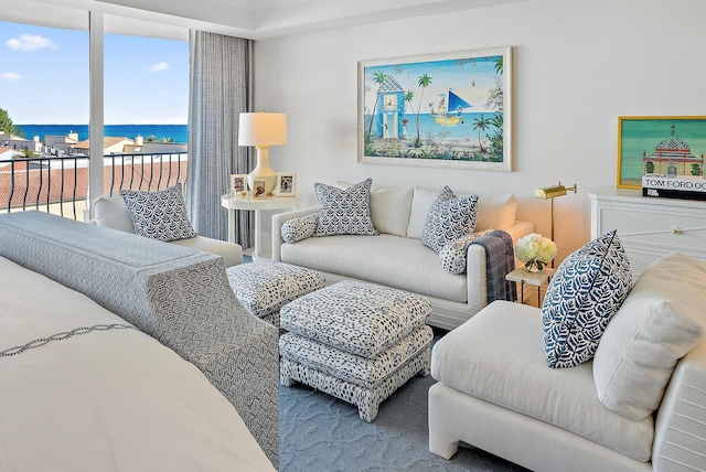 living room featuring a water view