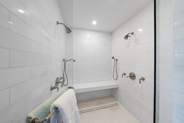 bathroom with a tile shower