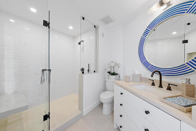 bathroom with ornamental molding, vanity, tile patterned flooring, toilet, and a shower with shower door