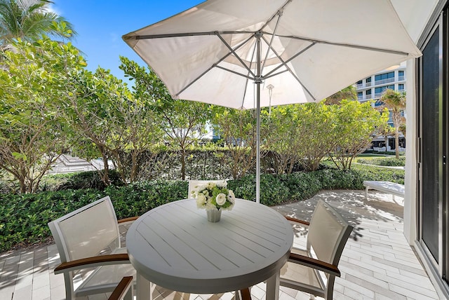 wooden deck featuring a patio area