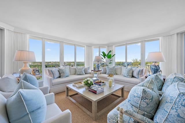 living room featuring a wall of windows