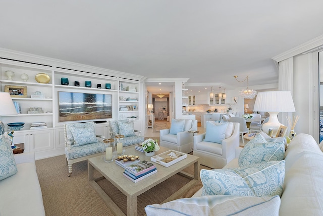 living room featuring built in features, light colored carpet, and ornamental molding