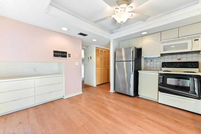 kitchen with backsplash, light hardwood / wood-style flooring, white appliances, and ornamental molding