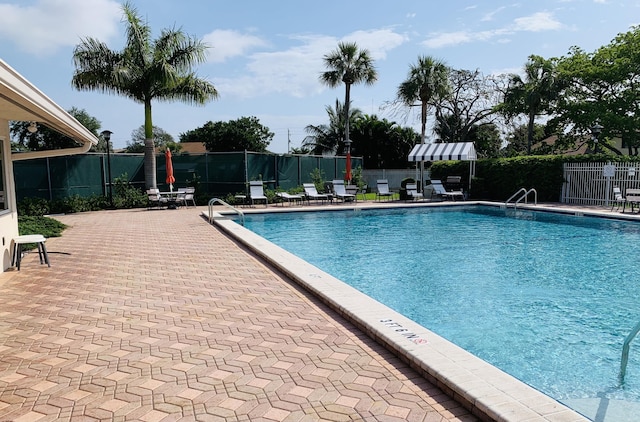 view of pool featuring a patio area