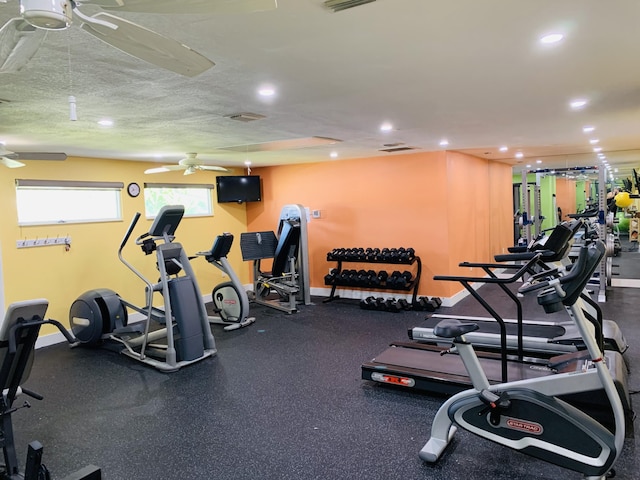 workout area with ceiling fan