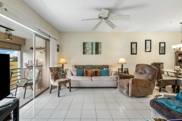 living room featuring ceiling fan and light tile patterned floors