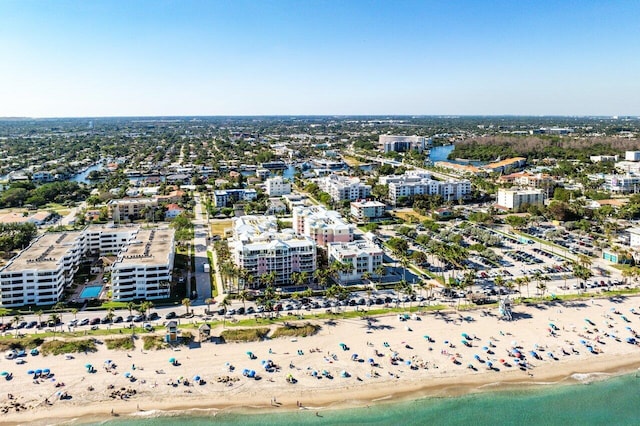 aerial view with a beach view and a water view