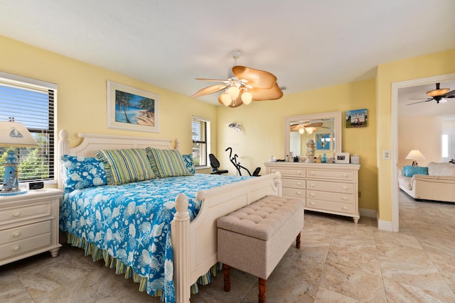 bedroom featuring ceiling fan