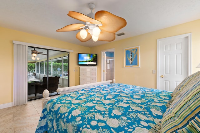 tiled bedroom with ceiling fan and access to outside