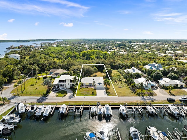 birds eye view of property featuring a water view