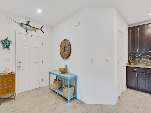 view of tiled foyer entrance