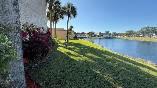 view of yard with a water view