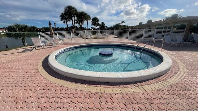 view of swimming pool with a patio area