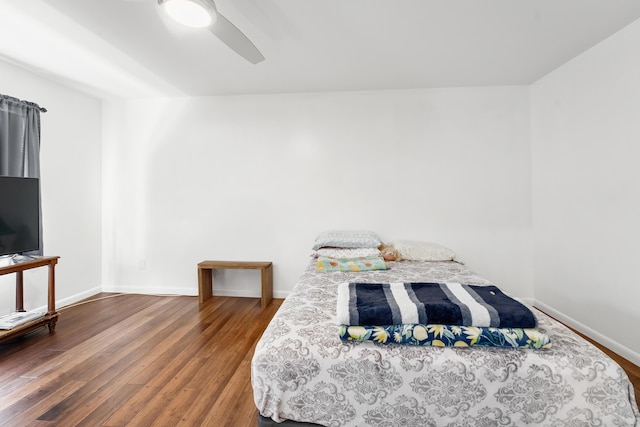 bedroom featuring ceiling fan and wood-type flooring