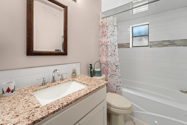 full bathroom featuring vanity, toilet, shower / bathtub combination with curtain, and tile walls