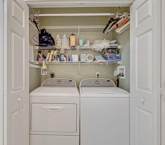 laundry room featuring washing machine and dryer