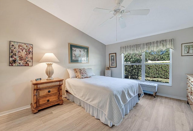 bedroom featuring vaulted ceiling, light hardwood / wood-style flooring, and ceiling fan