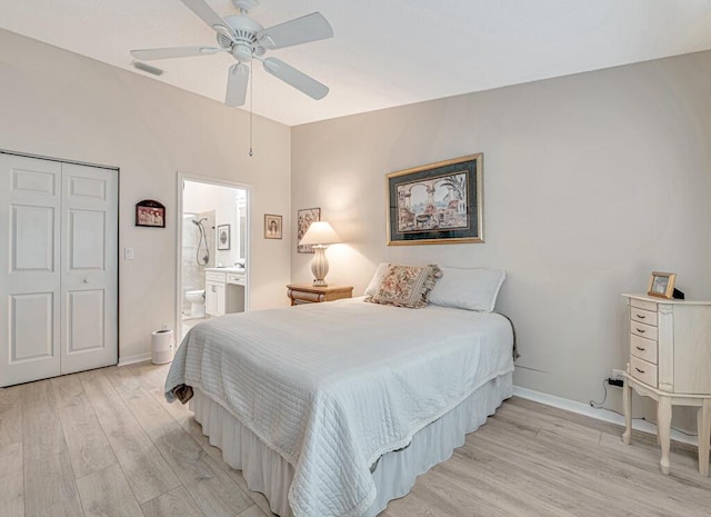 bedroom with connected bathroom, ceiling fan, a closet, and light hardwood / wood-style floors