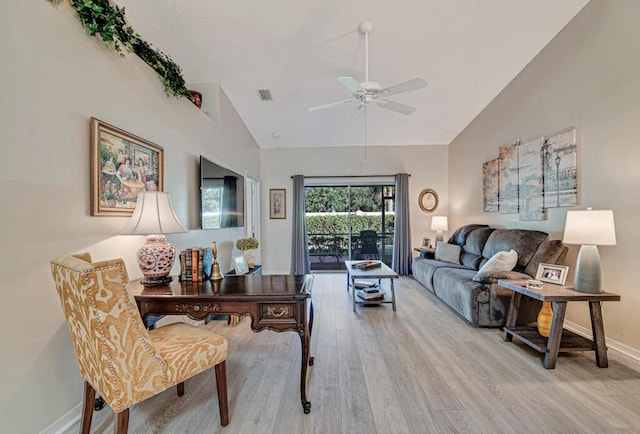 living room with ceiling fan, high vaulted ceiling, and light hardwood / wood-style floors