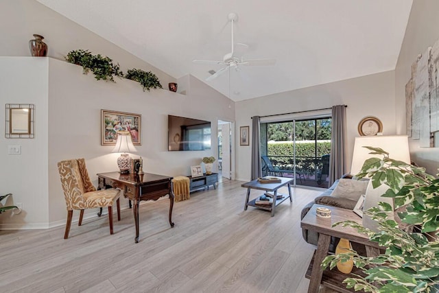 living room with ceiling fan, light wood-type flooring, and high vaulted ceiling